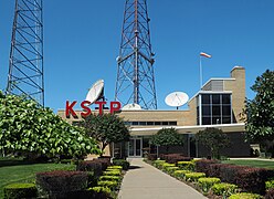 Entrance to the KSTP-AM-FM-TV studios on University Avenue. The sidewalk leading to the building lies precisely on the city line, as does the central leg of the tower.