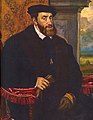 Carlos I de España, rey 1516, Emperador 1520, con gran coste y los interesados en América se rebelan, Comuneros y Germanías. Guerras con Francia en Italia, tras el cisma el Imperio Alemán se desune hasta la Paz de Augsburgo, Enrique VIII de Inglaterra casado con Catalina de Aragón busca un hijo, al no tenerlo crea el Anglicanismo para divorciarse, se casa 6 veces, y mata 2. Lega reinos a Fernando y Felipe.