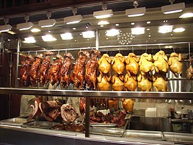Siu mei – roasted goose (top left), chicken (top right) and pork (bottom)