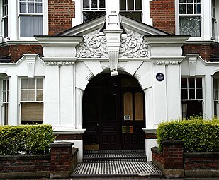 Arlington Park Mansions on Sutton Lane North, facing Turnham Green, with E. M. Forster blue plaque