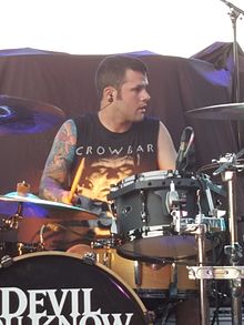 Augusto performing with Devil You Know in 2016