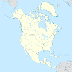 Mapa konturowa Ameryki Północnej, po lewej nieco u góry znajduje się punkt z opisem „Saxman”