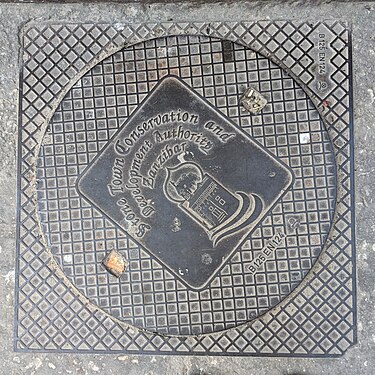 Zanzibar manhole cover with Stone Town picture