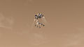 Rappresentazione artistica del rover Curiosity durante la parte finale della discesa, mentre viene rallentato dal modulo di discesa