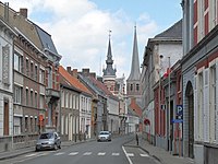 Toren van Huis Denys en Sint-Pieterskerk vanuit de Ieperstraat