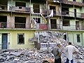 Zerstörts Wohnhus noch russischem Aagriff uf Gori im russisch-georgische Chrièg vom August 2008. Au e Spital und e Kindrgarte isch aagriffe worde.