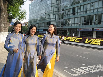 Vietnamese women in áo dài, a national costume for women