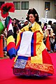 한국어: 한복 English: Hanbok, the traditional Korean dress.