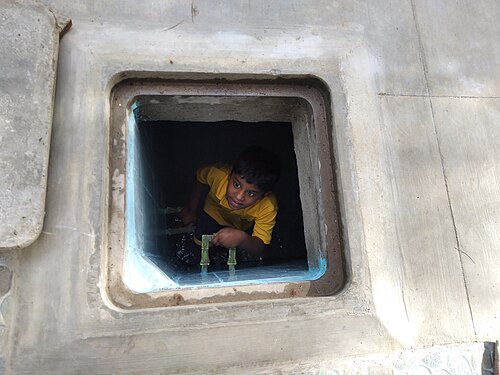 Child coming out of a sump