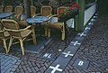 Border between Belgium and the Netherlands passing at a café