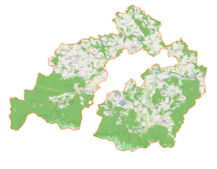 Mapa konturowa powiatu karkonoskiego, na dole nieco na prawo znajduje się punkt z opisem „Muzeum Zabawek”