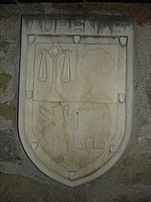 Lo blason de la vila sobre la façada de la comuna.