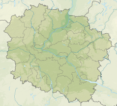 Mapa konturowa województwa kujawsko-pomorskiego, na dole po prawej znajduje się owalna plamka nieco zaostrzona i wystająca na lewo w swoim dolnym rogu z opisem „Grzywno”