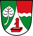 Gemeinde Putzbrunn Durch eine eingeschweifte silberne Spitze, darin ein roter Röhrenbrunnen mit Trog, gespalten; vorne in Grün ein silbernes Seeblatt, hinten durch einen schmalen silbernen Wellenbalken geteilt von Rot und Grün.
