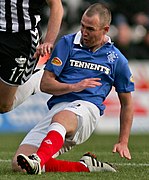 Kenny Miller - tackle.jpg