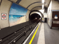 London Underground Tube Stock Train approaching station