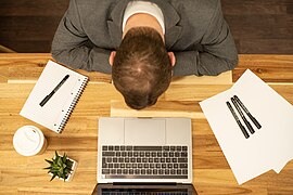 Man Showing Signs of Workplace Stress.jpg