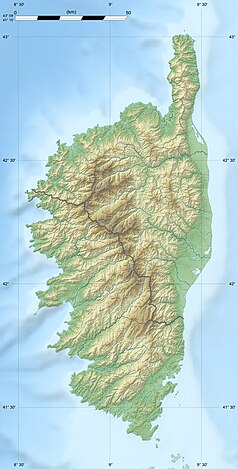 Mapa konturowa Korsyki, w centrum znajduje się punkt z opisem „źródło”, natomiast blisko centrum po lewej na dole znajduje się punkt z opisem „ujście”