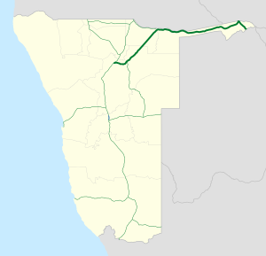 Map of Namibia with a long green line running from the north to the south of the country, with one section of the line coloured blue instead. The green sections of the line signifies the B1.
