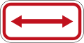 (R6-10.1) No Stopping (on both sides of this sign)
