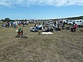 Spectators and competitors relax between the shooting.