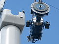 Image 23Typical components of a wind turbine (gearbox, rotor shaft and brake assembly) being lifted into position (from Wind power)