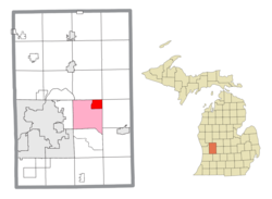 Location within Kent County (red) and an administered portion of the Forest Hills CDP (pink)