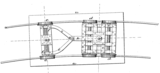 Patent del sistema Bissell: eix Bissell (Bissell truck, Bissell axle). Les dues rodes de l'esquerra estàn muntades en una estructura giratòria (que facilita la inscripció en trams de via corbats.