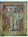 Bible de Saint-Paul-hors-les-Murs, manuscrit carolingien, produit vers 875 près de Reims, avec association de rinceaux végétaux et d'entrelacs de cordons.