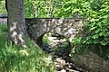 Rundbogenbrücke über das Klosterwasser, mit Wehr