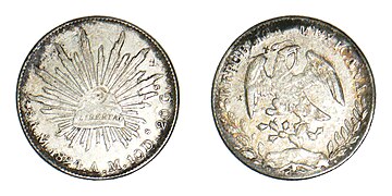Moneda mexicana de 8 reales.