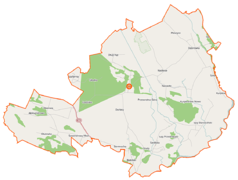 Mapa konturowa gminy Lelis, blisko centrum na dole znajduje się punkt z opisem „Durlasy”