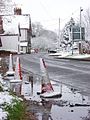 View of the B478 road in the snow with the French Horn in the background