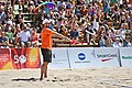 Image 22A linesman signals that a ball is "in" (from Beach volleyball)