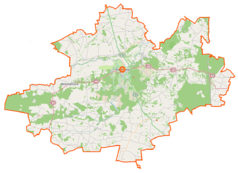 Mapa konturowa powiatu białobrzeskiego, blisko centrum u góry znajduje się punkt z opisem „Falęcice”