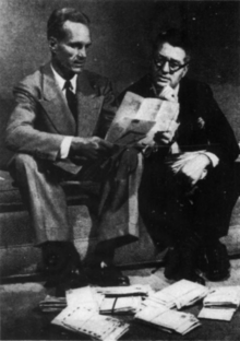 Two men sitting and talking