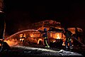 Burning buses in Kyiv after the attack, 16 May 2023