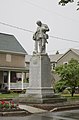 A memorial in the town to the local soldiers who died in the First and Second World Wars, and in the Korean War.