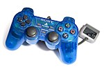 The transparent blue Sony DualShock controller from a different perspective.