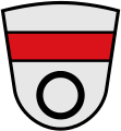 Gemeinde Westendorf Geteilt; oben geteilt von Silber und Rot, unten in Silber ein schwarzer Ring.