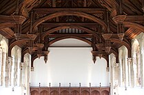 A double-hammerbeam wooden roof.