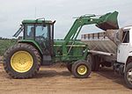 Thumbnail for File:John Deere 7210 with JD 720 FEL.jpg