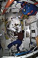 Christer Fuglesang moves into the outer section of the Quest Airlock as he prepares for the mission's fourth EVA