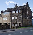 Image 46Former weavers' cottages in Wardle. An increase in domestic cloth production, and textile manufacture during the Industrial Revolution is attributed to a population boom in the area. (from Greater Manchester)