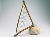 A loma belly harp, played by the Crau, Crau, Krao, Krawi, Kru, Nana peoples of West Africa.