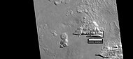 Possible variation of scalloped terrain in depressions with straight southern walls, as seen by HiRISE under HiWish program. Box indicates part enlarged in images below. Image located in Diacria quadrangle in Milankovic crater.