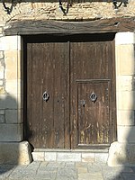Porta de fusta del Mas d'en Bosch, Cambrils, amb la inscripció 1739 a la llinda de fusta