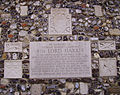 A typical medieval wall (with modern memorial) at Canterbury Cathedral – knapped and unknapped ("cobble") flints are mixed with pieces of brick and other stones.