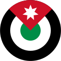Jordan 1949 to present Roundel of black, white, and green rings with superimposed red quarter with white seven point star