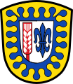 Gemeinde Emersacker Von Gold und Blau im Wolkenschnitt geteilter Schildbord; in Silber nebeneinander eine rote Ähre und eine blaue Lilie.